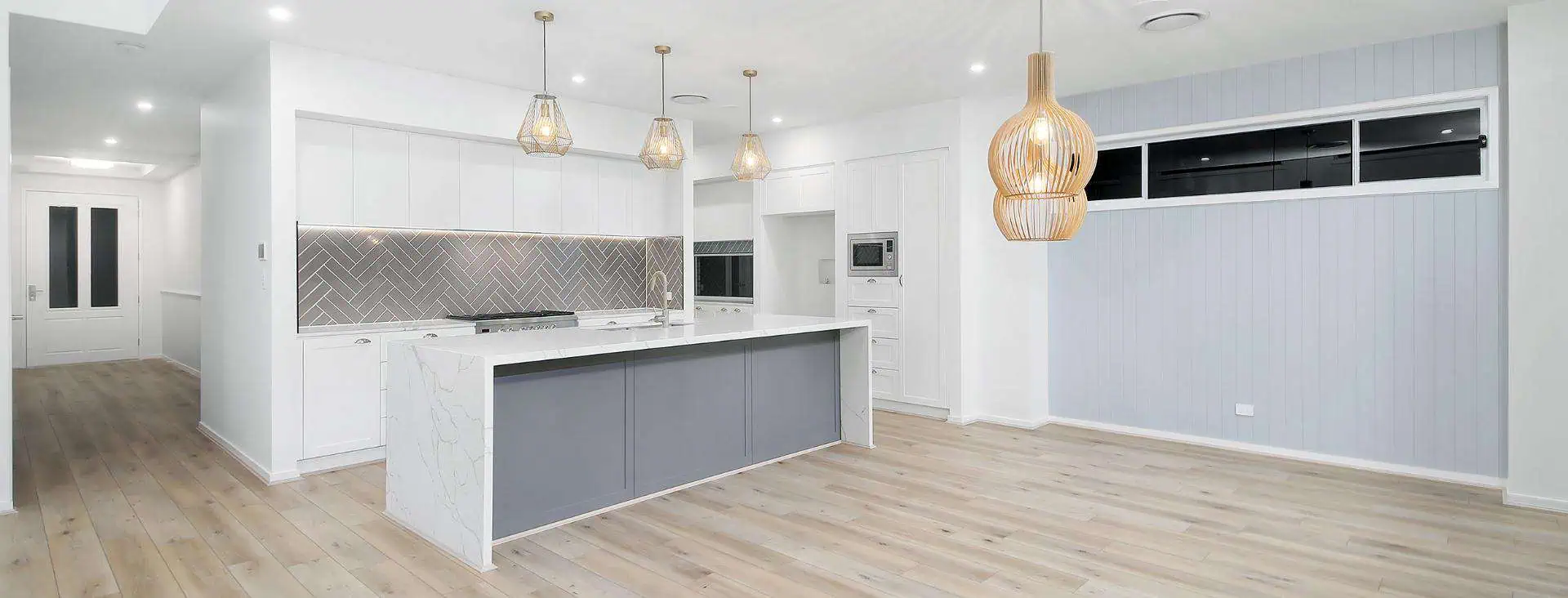 A modern open plan kitchen in a custom new home in Brisbane